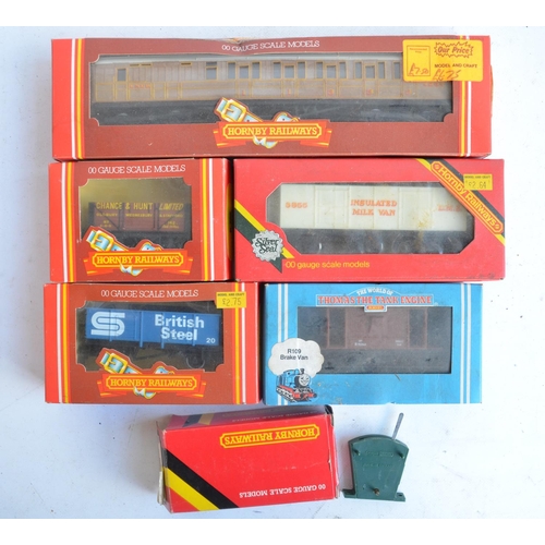 150 - Collection of previously run OO gauge railway models and accessories from Hornby to include an R324 ... 