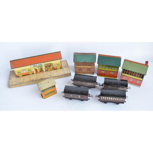 157 - Collection of unboxed vintage Hornby Meccano O gauge lithographed tinplate buildings and 4 passenger... 