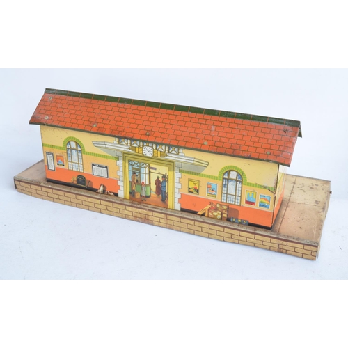 157 - Collection of unboxed vintage Hornby Meccano O gauge lithographed tinplate buildings and 4 passenger... 