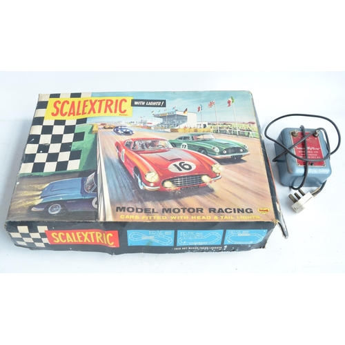 162 - Vintage Scalextric Set 60 with extra early cars with working steering. Set A/F, box poor. Also inclu... 