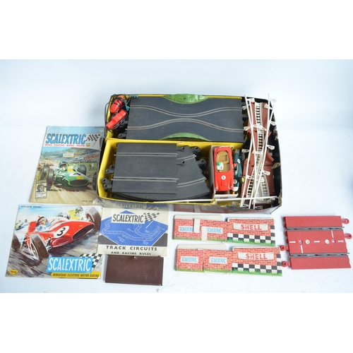 162 - Vintage Scalextric Set 60 with extra early cars with working steering. Set A/F, box poor. Also inclu... 