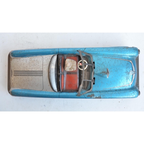 173 - Vintage West German lithographed pressed steel push along friction powered car model with working wi... 