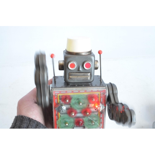 175 - Charming vintage (C1960's) Japanese made battery powered tinplate robot figure in good external cond... 