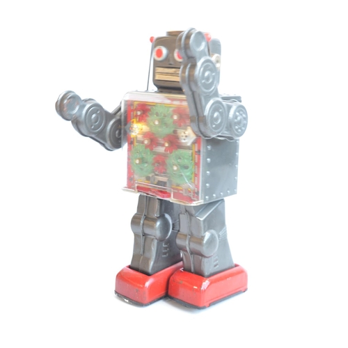 175 - Charming vintage (C1960's) Japanese made battery powered tinplate robot figure in good external cond... 