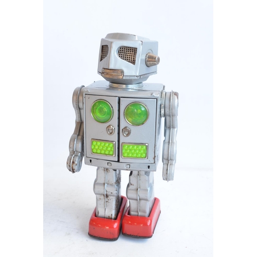 176 - Charming vintage (C1960's) Japanese made battery powered tinplate robot figure in good external cond... 