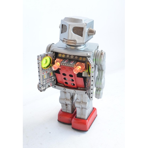 176 - Charming vintage (C1960's) Japanese made battery powered tinplate robot figure in good external cond... 