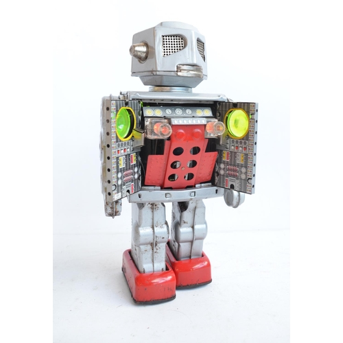 176 - Charming vintage (C1960's) Japanese made battery powered tinplate robot figure in good external cond... 