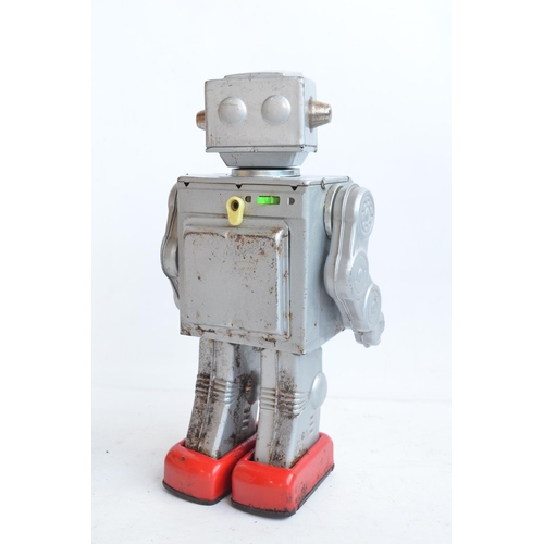 176 - Charming vintage (C1960's) Japanese made battery powered tinplate robot figure in good external cond... 