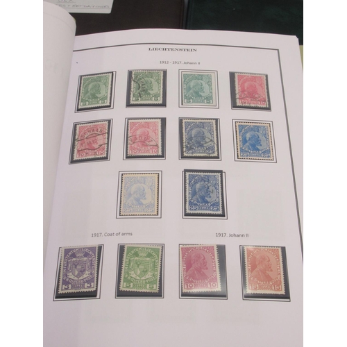 830 - Davo Liechtenstein stamp album, 2 stamp albums cont. various world stamps, Davo USA stamp album and ... 