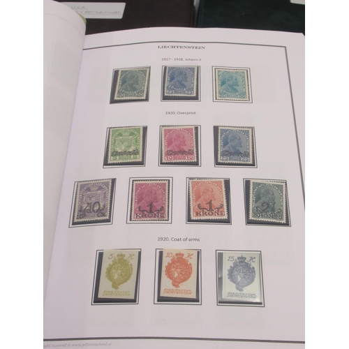 830 - Davo Liechtenstein stamp album, 2 stamp albums cont. various world stamps, Davo USA stamp album and ... 