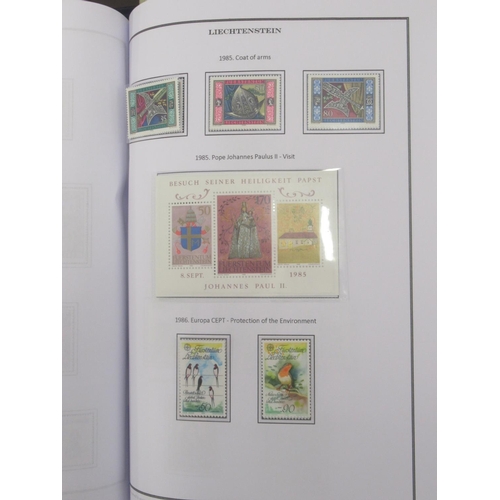 830 - Davo Liechtenstein stamp album, 2 stamp albums cont. various world stamps, Davo USA stamp album and ... 