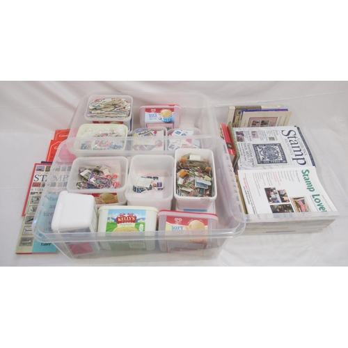 832 - Large assorted collection of loose stamps (both on and off paper) and a collection of stamp magazine... 