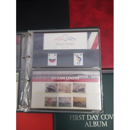 818 - Large assorted collection of GB First Day Covers and Royal Mint Stamps held in 19 albums (Qty.)