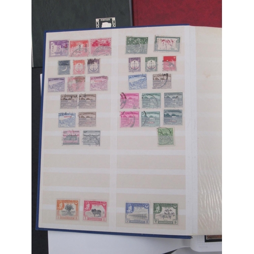 844 - Assorted collection of International and British stamps in 15 folders/albums