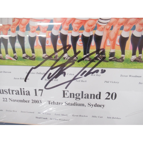 946 - John Ireland '2003 World Champions' signed print with Martin Johnson's signature and a Clive Woodwar... 