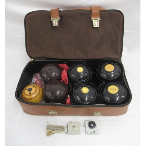 954 - 3 Sets of Crown Green Bowls, a Jack and measures in travel bag.