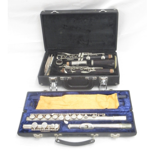 924 - Cased Boosey & Hawkes Series 2-20 clarinet and a cased Blessing Elkhart flue (2)