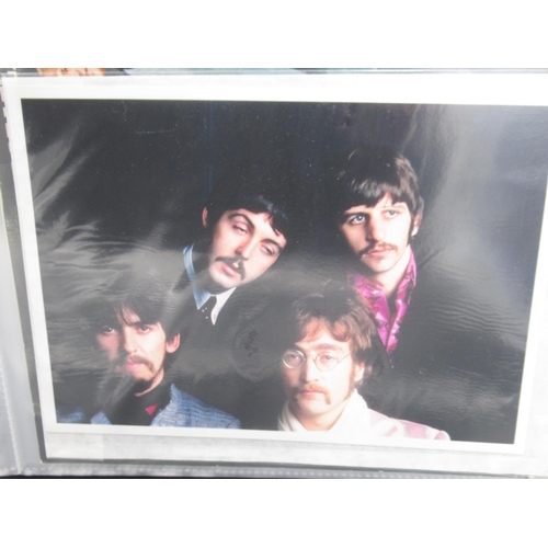 931 - Beatles - folder cont. 14 movie cells relating to the Beatles, Transparencies, photos, etc.