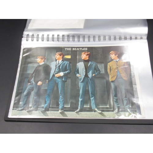 931 - Beatles - folder cont. 14 movie cells relating to the Beatles, Transparencies, photos, etc.