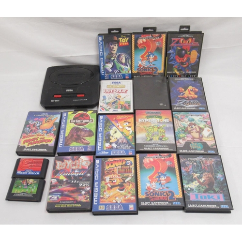 288 - Sega Mega Drive II 16-bit console(lacking adapter or controller) 15 boxed games(4 lacking manuals) a... 