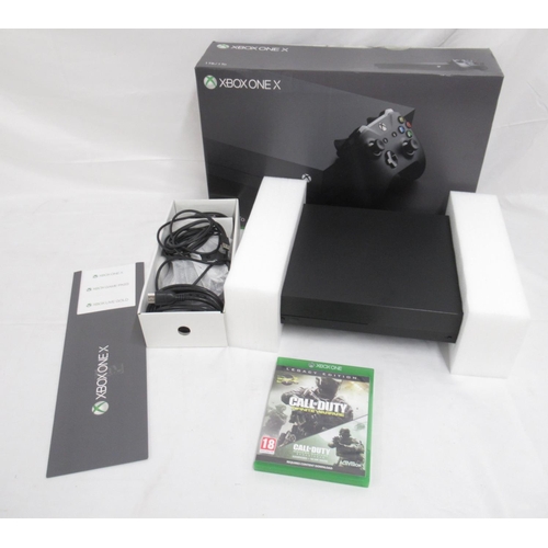 291 - Xbox One X console with controller and original box, with Call of Duty Legacy Edition Advanced Warfa... 