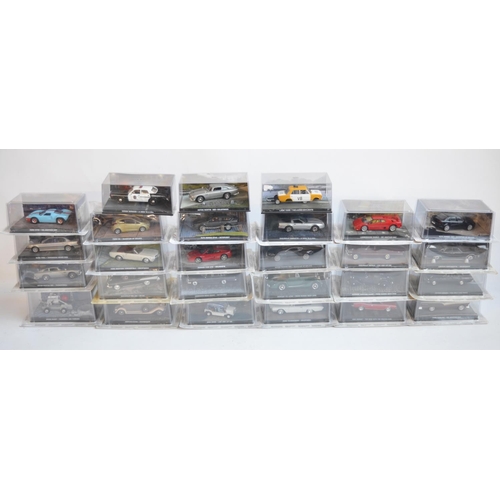 211 - Seventy nine cased 1/43 scale diecast James Bond vehicle models from GE Fabbri to include Moon Buggy... 