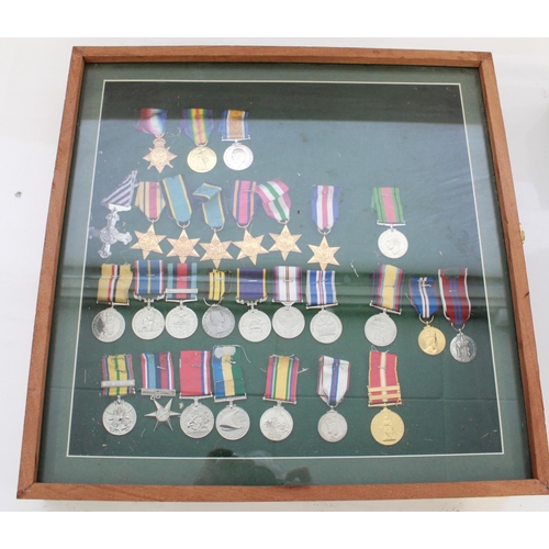 1058 - Large collection of Medals from various countries and conflicts. WWI Victory Medals, WWII Stars, Jub... 