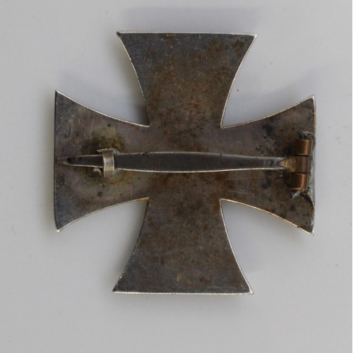 1068 - WWI Iron Cross, 1st Class. With original pin. Showing slight wear to numbers, 'W' and crown, but ove... 