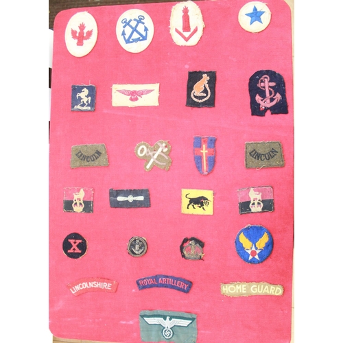 1070 - Boards containing collection of cloth badges incl. Royal Artillery, RAF, RAF Tropical, Desert Rats, ... 