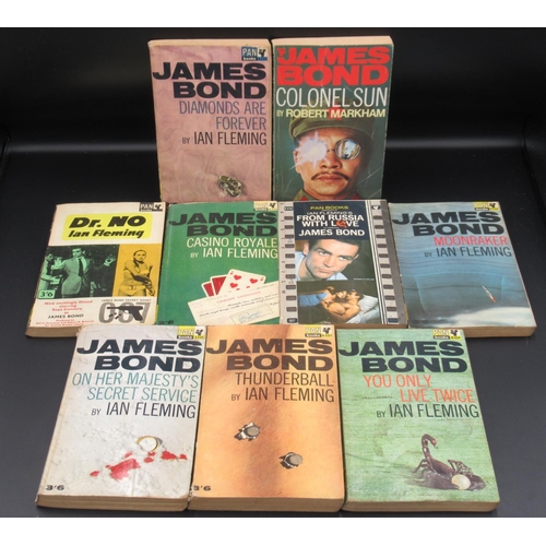 910 - Assorted collection of books, predominantly Military related to inc. 9 James Bond Pan paperbacks (3 ... 