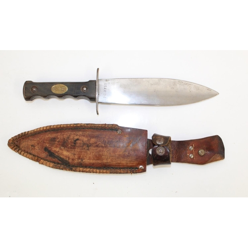 1094 - WW2 Italian African Police dagger, original horn handle with inset brass emblem of a crowned eagle s... 