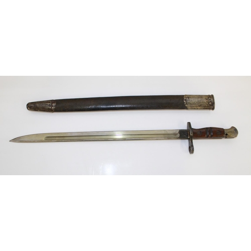 1086 - 1911 US Army Bayonet complete with original leather scabbard.