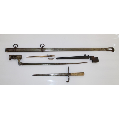 1089A - Collection of edged-weapons and related items. To include a British Mk 4 Lee-Enfield 'pig-sticker' w... 