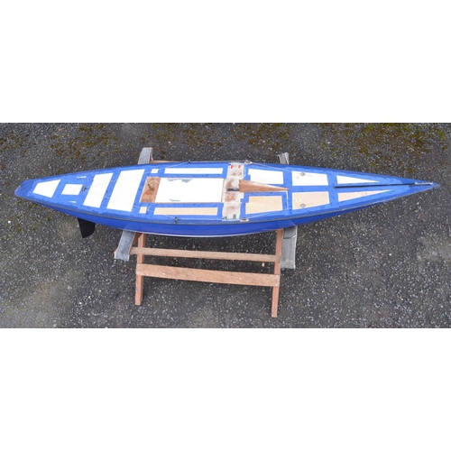 265 - Large fibre glass radio controlled yacht model with mast/sail case. Hull length 161cm