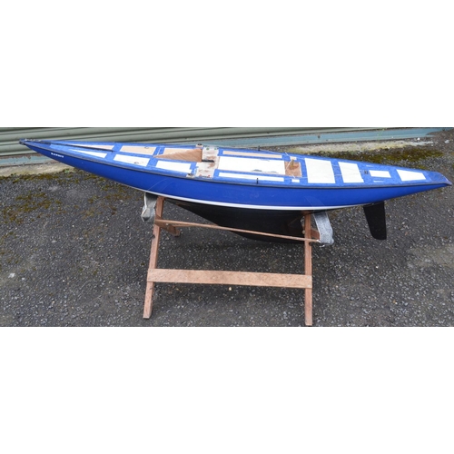 265 - Large fibre glass radio controlled yacht model with mast/sail case. Hull length 161cm