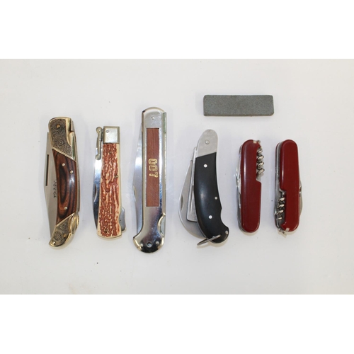 1099 - Collection of six pocket knives of various styles, to include two utility knives, a pruning knife, e... 