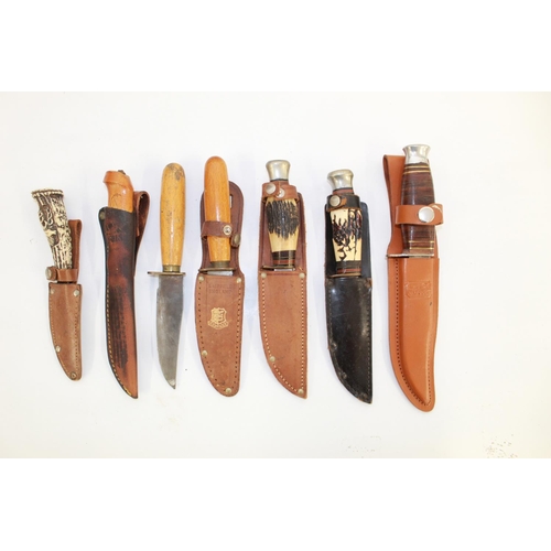 1100 - Collection of seven sheath knives of various styles, including a John Knowles of Sheffield scouting ... 