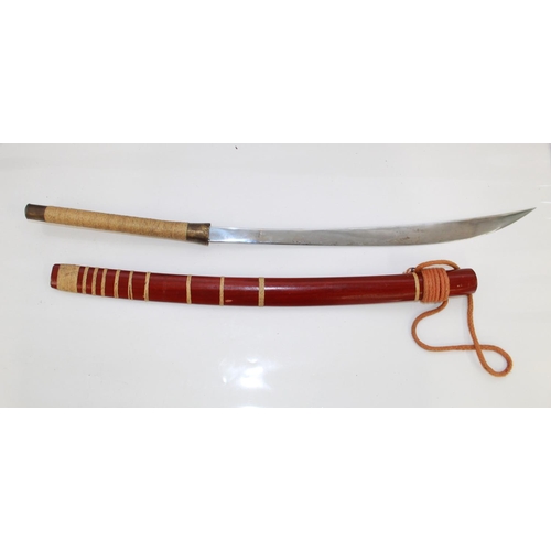 1106 - Circa 19th century ceremonial Burmese Dha, complete with original wooden scabbard and orange rope ta... 