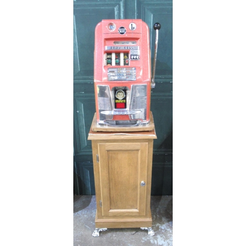 267 - Sega-Bell One Arm Bandit Fruit Machine Slot Machine, H67.3cm W41cm D39.5cm, on a oak single door cab... 