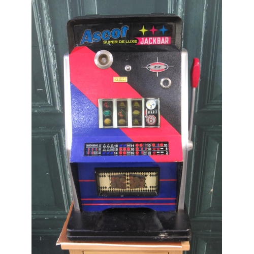 270 - Ascot Super De Luxe One Armed Bandit Slot Machine, in working order, H75cm W46cm D45cm, on a oak 2 d... 