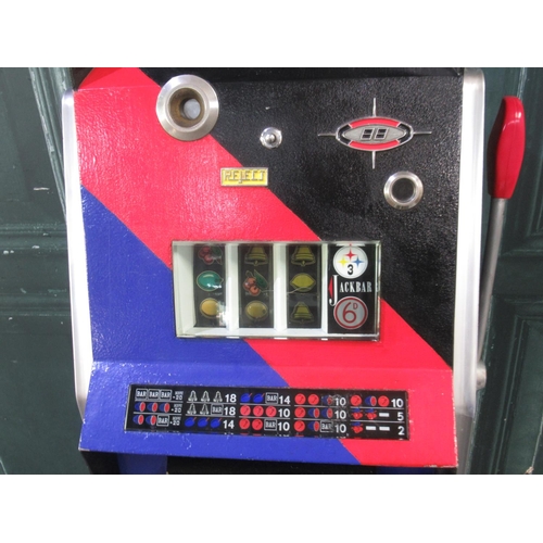 270 - Ascot Super De Luxe One Armed Bandit Slot Machine, in working order, H75cm W46cm D45cm, on a oak 2 d... 