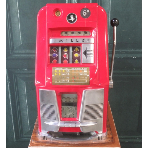 274 - Mills Hi-Top One Armed Bandit Slot Machine, H64.5cm W44.5cm D40cm , on a single door cabinet,