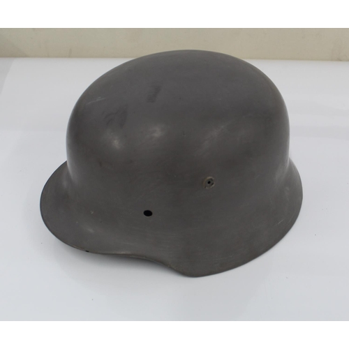 1127 - WW2 German steel helmet, lacking liner and repainted in battleship grey.