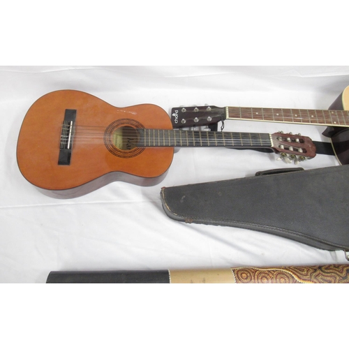 922 - Chord CW26 6 string acoustic guitar, Martinez MTC-11 6 string Spanish guitar, Supreme Class 1 banjo ... 