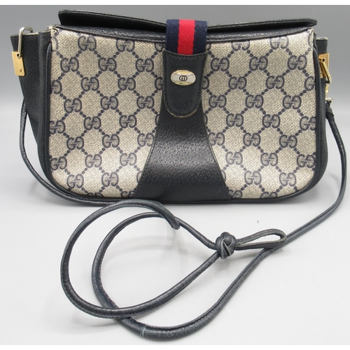 1060 - Gucci cross body bag, serial number 1002024, navy colourway, W 26cm, with branded dust bag