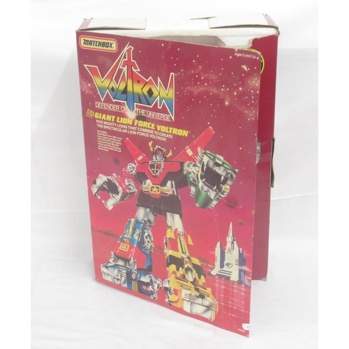 352 - Matchbox Voltron Giant Lion Force Voltron, heavy damage to box, all figures are present, with wear t... 