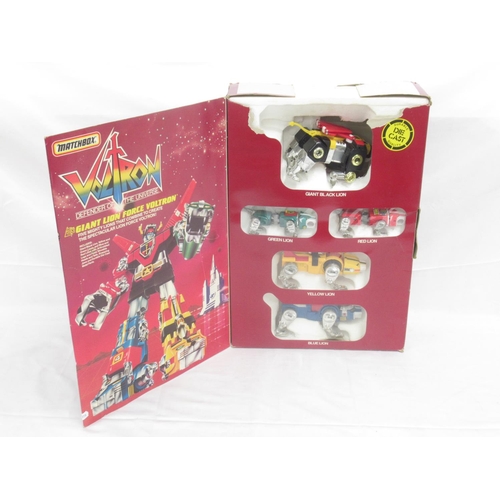 352 - Matchbox Voltron Giant Lion Force Voltron, heavy damage to box, all figures are present, with wear t... 