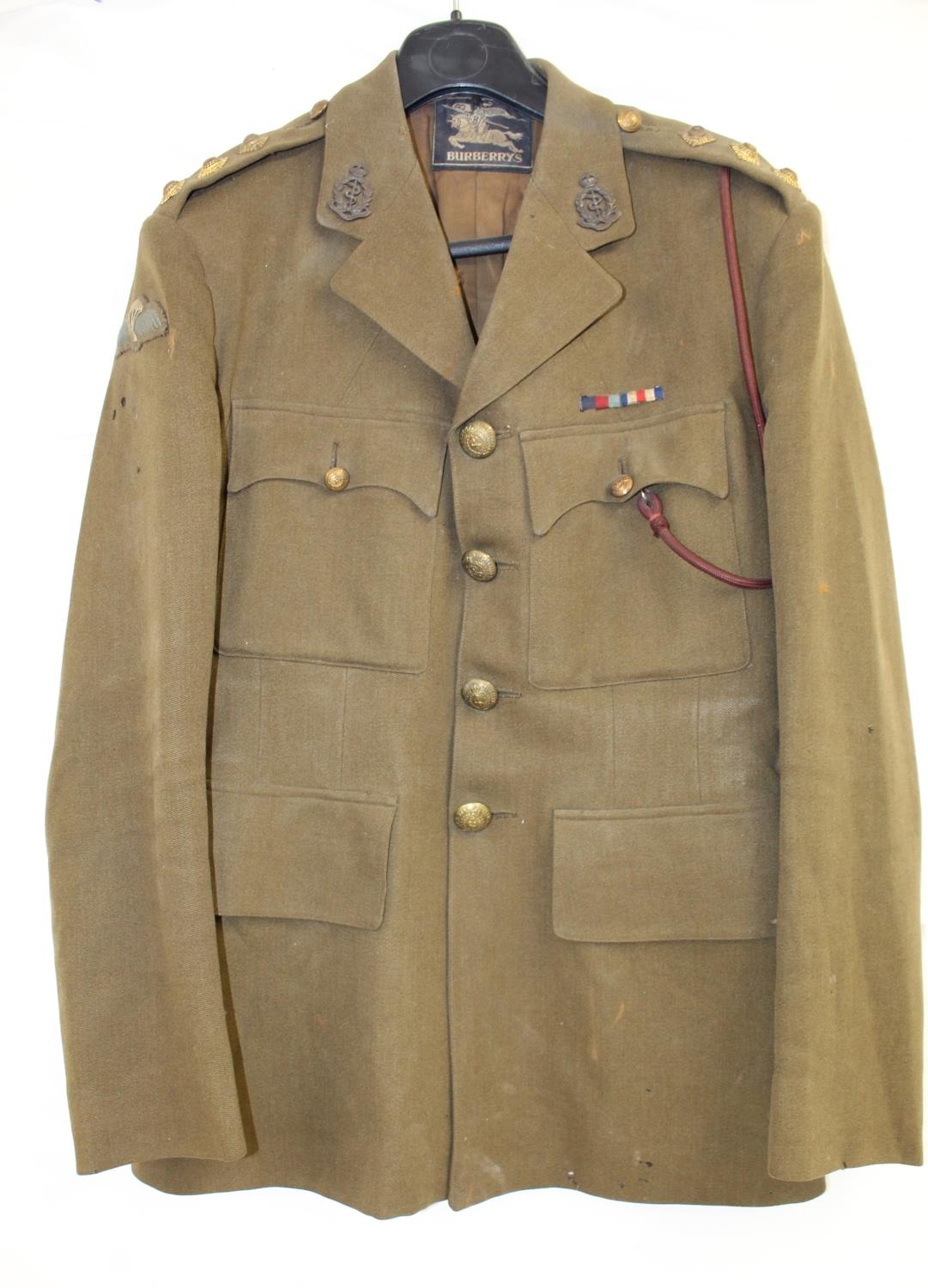 WW2 Captains uniform by Burberry's. Insignia and cap badge suggest ...