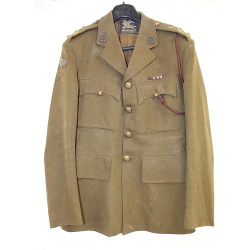 1130 - WW2 Captains uniform by Burberry's. Insignia and cap badge suggest membership of the Royal Medical C... 