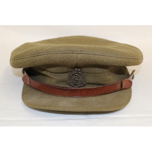 1130 - WW2 Captains uniform by Burberry's. Insignia and cap badge suggest membership of the Royal Medical C... 